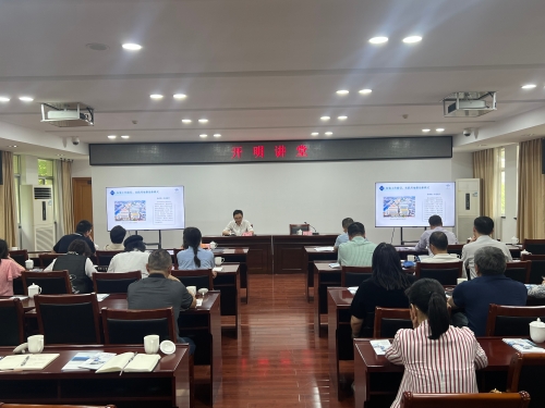 图为区工改中心向区政协委员作汇报现场.JPG